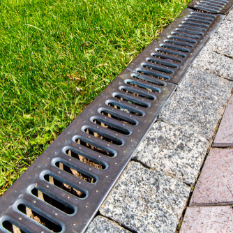 Essential Factors When Choosing the Perfect Drain & Grate for Your Landscape Project